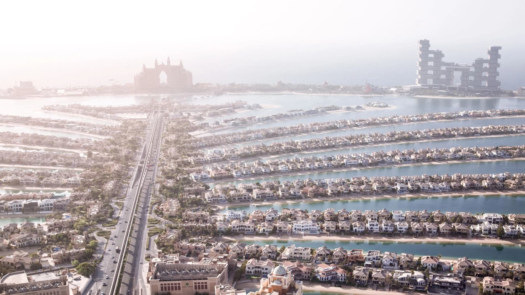 Aerial view down the trunk of Palm Jumeirah with Atlantis and the Royal Atlantis at the crescent