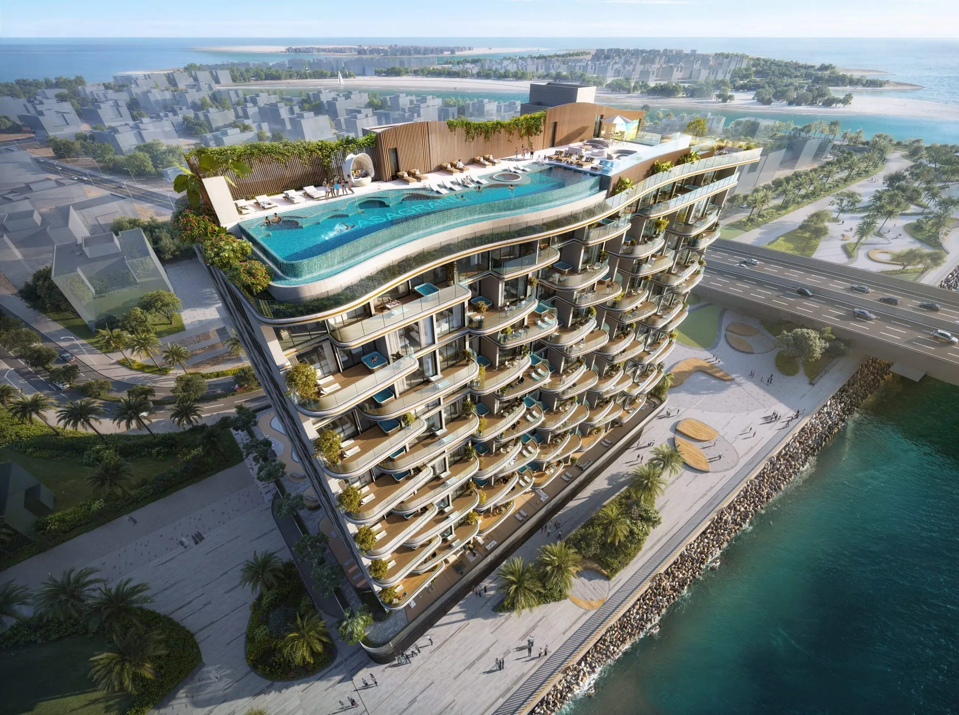 Aerial with rooftop pool, promenade and island villas