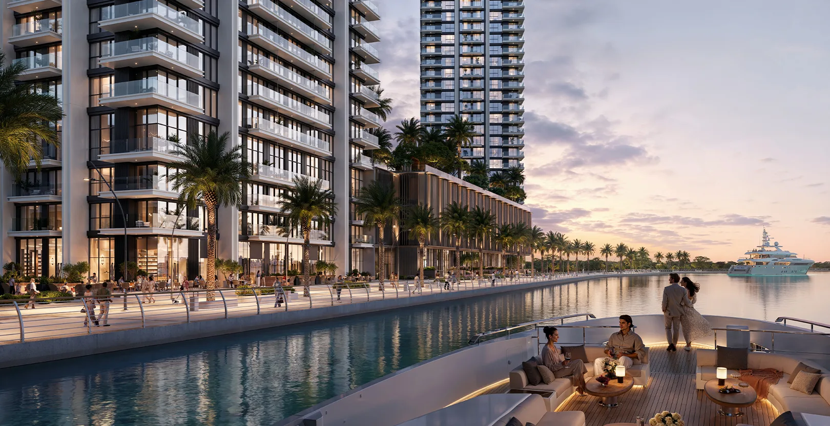 Creek Bay promenade and towers at dusk from the water