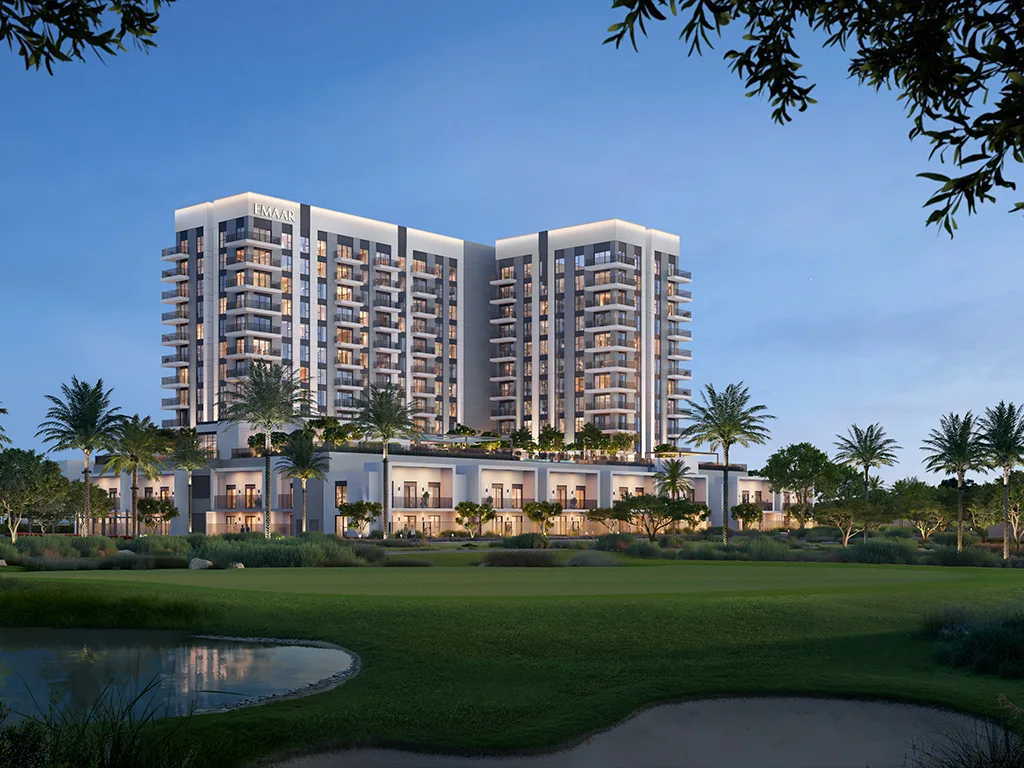 Mid-rise across a golf green at dusk