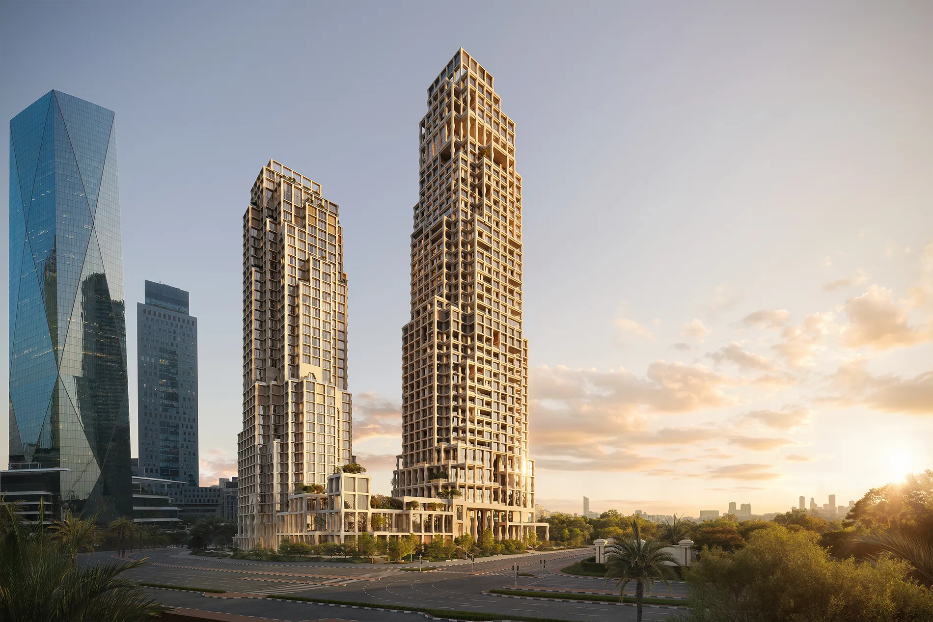 Twin stacked-grid Janu towers at golden hour in DIFC