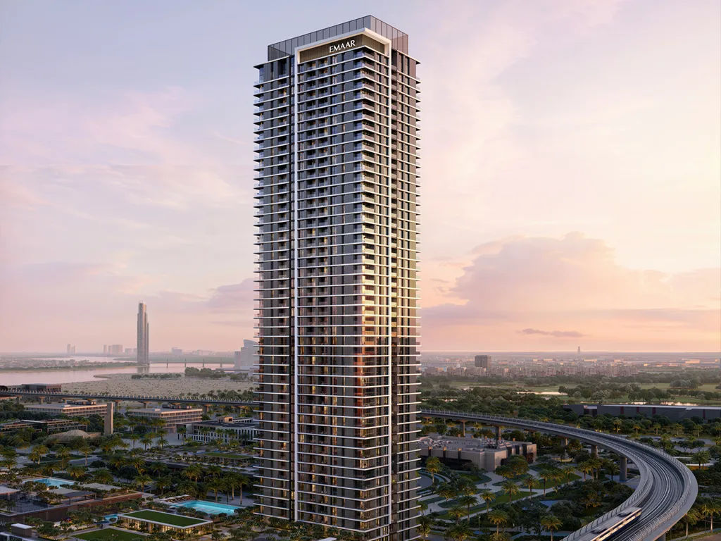 Montiva tower at sunset beside the elevated rail line