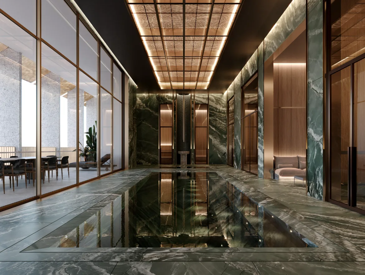 Indoor lap pool in green marble with bronze mesh ceiling