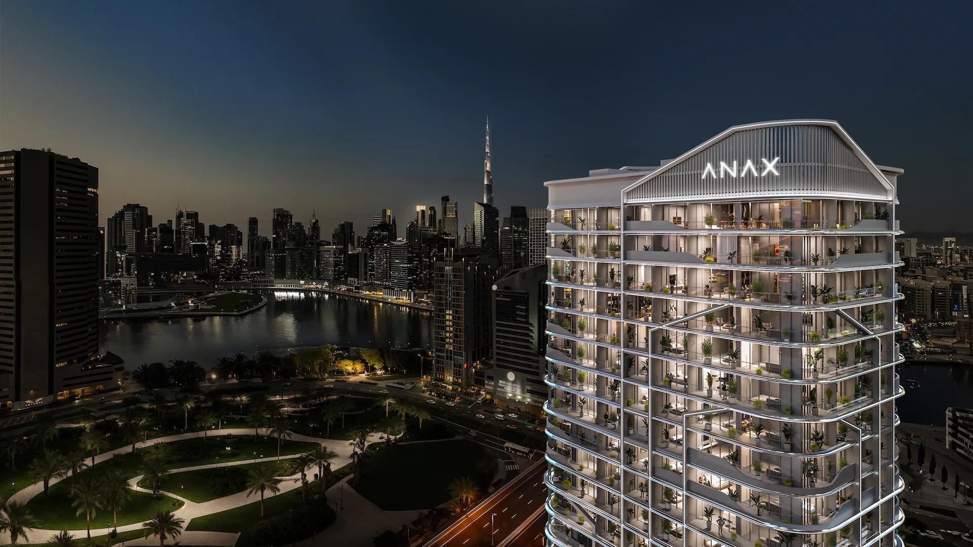 ANAX tower over the canal loop at night